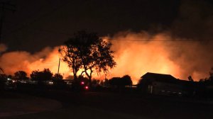 A brush fire ignited along the 5300 block 46th Avenue in Jurupa Valley on Oct. 31, 2019. (Credit: @Edgar_f11 on Twitter)