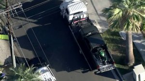 A tow truck is seen parked at the scene of a fatal shooting in Riverside on Oct. 7, 2019.