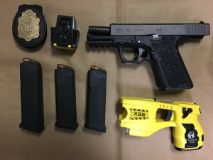 Police in Costa Mesa seized these items while arresting a woman they say was impersonating a police officer on Nov. 1, 2019. (Credit: Costa Mesa Police Department)