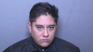 Michelle Briana Hughes, 30, of Huntington Beach, pictured in a photo released by the Costa Mesa Police Department following her arrest on Nov. 2, 2019.