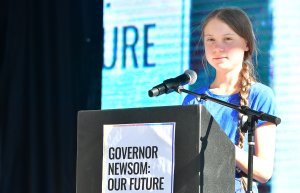 Teenage Swedish activist Greta Thunberg addresses the crowd while attending a climate action rally in Los Angeles on Nov. 1, 2019. (Credit: Frederic J. Brown / AFP / Getty Images)