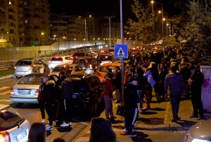 Residents gather outdoors in Tirana after a 6.4 magnitude quake struck the Adriatic coastline of Albania on Nov. 26, 2019. (Credit: GENT SHKULLAKU / AFP / Getty Images)
