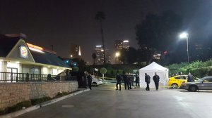 Los Angeles Police Department officers investigate a fatal stabbing at Grand Avenue and Cesar E. Chavez Avenue in downtown Los Angeles on Nov. 15, 2019. (Credit: KTLA)