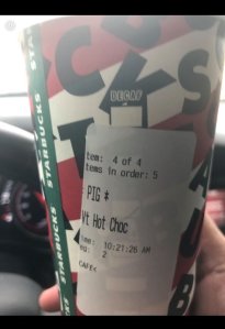 A police chief in Oklahoma said one of his officers picked up a coffee order from a local Starbucks on Thanksgiving with the word "PIG" printed on the label. (Credit: Johnny O'Mara / Facebook)