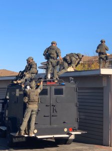 Los Angeles County Sheriff's Department special enforcement deputies serve a warrant in search of a murder suspect wanted by the Los Angeles Police Department in Rowland Heights on Nov. 9, 2019. (Credit: LASD)