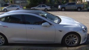 A Tesla believed to be linked to a hit-and-run was recovered in Harvard Heights on Nov. 22, 2019. (Credit: KTLA)