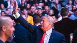 President Donald Trump waves to the crowd as he attends the Ultimate Fighting Championship at Madison Square Garden in New York City, New York on November 2, 2019. (Credit: Andrew Caballero-Reynolds/AFP/Getty Images)