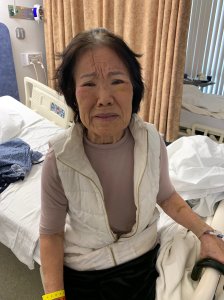 An unidentified woman receiving medical care who officials hope to identify is seen in a photo released Nov. 19, 2019, by the San Bernardino County Sheriff’s Department.