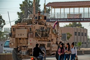 A U.S. military vehicle is pictured east of the Kurdish-controlled northeastern Syrian city of Qamishli on Nov. 13, 2019. (Credit: Delil Souleiman / AFP / Getty Images)