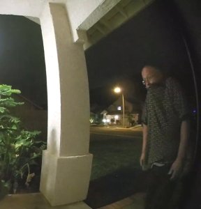 A security video still provided by the Riverside County Sheriff's Department on Dec. 24, 2019 shows a man suspected of taking packages from a Jurupa Valley home's porch.