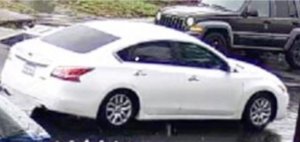 A Nissan Altima believed to have been used during the crime is shown in a photo released by the U.S. Postal Inspection Service on Dec. 30, 2019. 