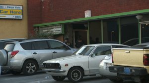 Authorities raid a marijuana dispensary in Palms on Dec. 12, 2019. (Credit: KTLA)