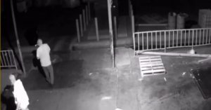 A man suspected of shooting a Watts business owner in August is seen on the right in a surveillance still released by the victim on Dec. 6, 2019.