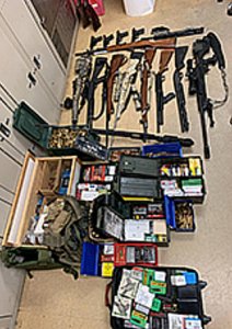 Weapons found in a Menifee home are displayed in a photo from the Riverside County Sheriff's Department on Dec. 17, 2019.