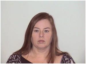 Melodie Gliniewicz booking photo via Lake County Sheriff’s Office