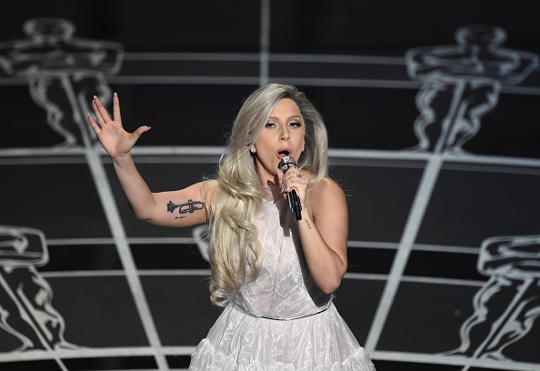 Lady Gaga performs on stage at the 87th Oscars February 22, 2015 in Hollywood, California. AFP PHOTO / Robyn BECK (Photo credit should read ROBYN BECK/AFP/Getty Images)