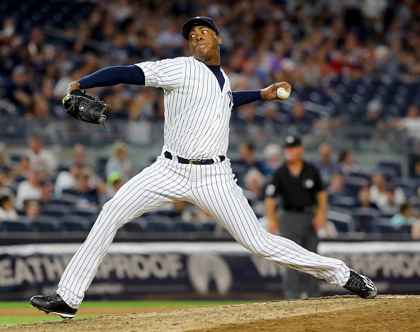 Aroldis Chapman #54 of the New York Yankees delivers a pitch in the ninth inning against the Boston Red Sox at Yankee Stadium on July 15, 2016 in the Bronx borough of New York City.The Boston Red Sox defeated the New York Yankees 5-3. (Photo by Elsa/Getty Images)