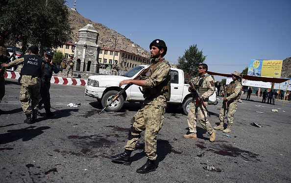 Afghan security personnel arrive after a suicide attack that targeted crowds of minority Shiite Hazaras during a demonstration at the Deh Mazang Circle of Kabul on July 23, 2016. Islamic State jihadists claimed responsibility for twin explosions July 23 that ripped through crowds of Shiite Hazaras in Kabul, killing at least 61 people and wounding 207 others in apparently their deadliest attack in the Afghan capital. The bombings during a huge protest over a power transmission line could deepen sectarian divisions in a country well known for communal harmony despite decades of war. (WAKIL KOHSAR/AFP/Getty Images)