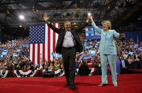 Democratic presidential candidate former Secretary of State Hillary Clinton and Democratic vice presidential candidate U.S. Sen. Tim Kaine (D-VA) greet supporters during a campaign rally at Florida International University Panther Arena on July 23, 2016 in Miami, Florida. Hillary Clinton and Tim Kaine made their first public appearance together a day after the Clinton campaign announced Senator Kaine as the Democratic vice presidential candidate. (Photo by Justin Sullivan/Getty Images)