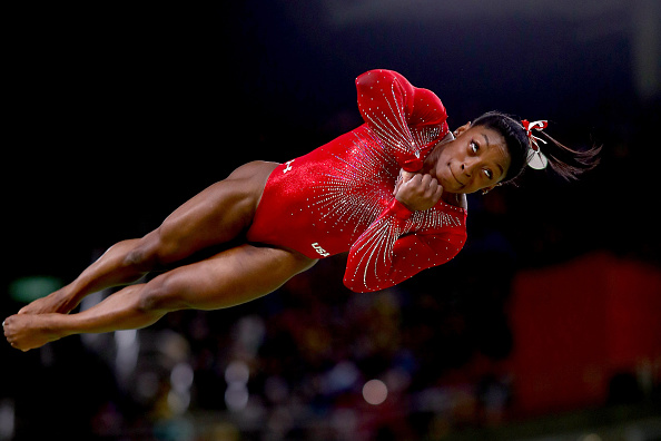 Simone Biles of the United States competes in the Women's Vault Final on Day 9 of the Rio 2016 Olympic Games at the Rio Olympic Arena on August 14, 2016 in Rio de Janeiro, Brazil. (Photo by Ryan Pierse/Getty Images)