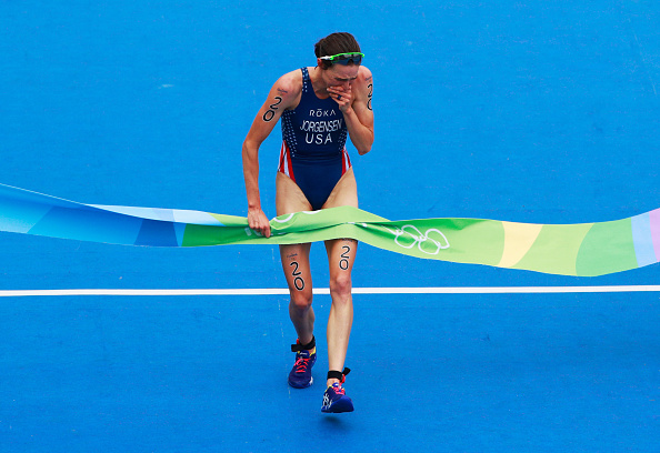 Gwen Jorgensen of the United States shows her emotions as she crosses the line to win gold during the Women's Triathlon on Day 15 of the Rio 2016 Olympic Games at Fort Copacabana on August 20, 2016 in Rio de Janeiro, Brazil. (Photo by Adam Pretty/Getty Images)