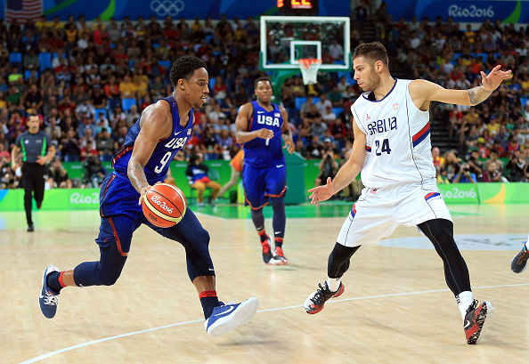 Demar DeRozan #9 of the USA dribbles the ball as Stefan Jovic #24 of Serbia defends during the Men's Gold medal game between Serbia and the USA on Day 16 of the Rio 2016 Olympic Games at Carioca Arena 1 on August 21, 2016 in Rio de Janerio, Brazil. (Photo by Vaughn Ridley/Getty Images)