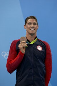 RIO DE JANEIRO, BRAZIL - AUGUST 08: Bronze medalist Conor Dwyer of the United States poses on the podium during the medal ceremony for the Men's 200m Freestyle Final on Day 3 of the Rio 2016 Olympic Games at the Olympic Aquatics Stadium on August 8, 2016 in Rio de Janeiro, Brazil. (Photo by Al Bello/Getty Images)