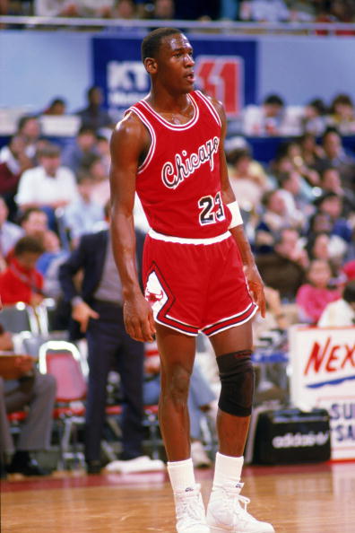 Michael Jordan #23 of the Chicago Bulls stands on the court moves the ball at the parameter against the Los Angeles Clippers at the Sports Arena in Los Angeles, California. (Photo by Rick Stewart/Getty Images)