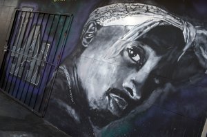 A wall dedicated to the memory of US rapper Tupac Shakur is seen on May 26, 2016 in Los Angeles, California. Twenty years after his death, Tupac still reigns. Other rappers have succeeded him in stardom, and promotional efforts around Tupac have been haphazard, but the artist who died at age 25 on September 13, 1996, in Las Vegas, maintains a hold that is among the most enduring in recent times. / AFP / VALERIE MACON / TO GO WITH AFP STORY by Shaun TANDON, "20 years on, Tupac reigns as potent global force" (Photo credit should read VALERIE MACON/AFP/Getty Images)