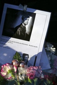 A message of condolence lies with flowers outside the north London home of British singer George Michael on December 26, 2016, as news of the singer's death spread. Tributes poured in from the music world on Monday as British pop superstar George Michael, who rose to fame with the duo Wham! and a string of smash hits including "Last Christmas", dies aged 53. / AFP / Daniel LEAL-OLIVAS (Photo credit should read DANIEL LEAL-OLIVAS/AFP/Getty Images)