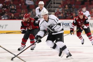 GLENDALE, AZ - SEPTEMBER 26: Michael Latta #17 of the Los Angeles Kings skates with the puck during the preseason NHL game against the Arizona Coyotes at Gila River Arena on September 26, 2016 in Glendale, Arizona. (Photo by Christian Petersen/Getty Images)