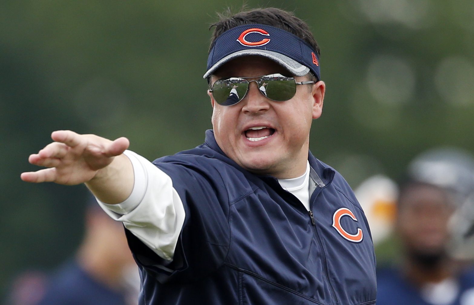 Chicago Bears offensive coordinator Dowell Loggains talks to his team during practice at Olivet Nazarene University, in Bourbonnais, Ill. (AP Photo/Nam Y. Huh)