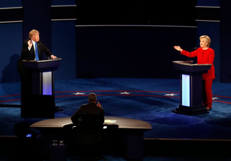 Republican presidential nominee Donald Trump and Democratic presidential nominee Hillary Clinton gesture during the presidential debate at Hofstra University in Hempstead, N.Y., Monday, Sept. 26, 2016. (AP Photo/Mary Altaffer)