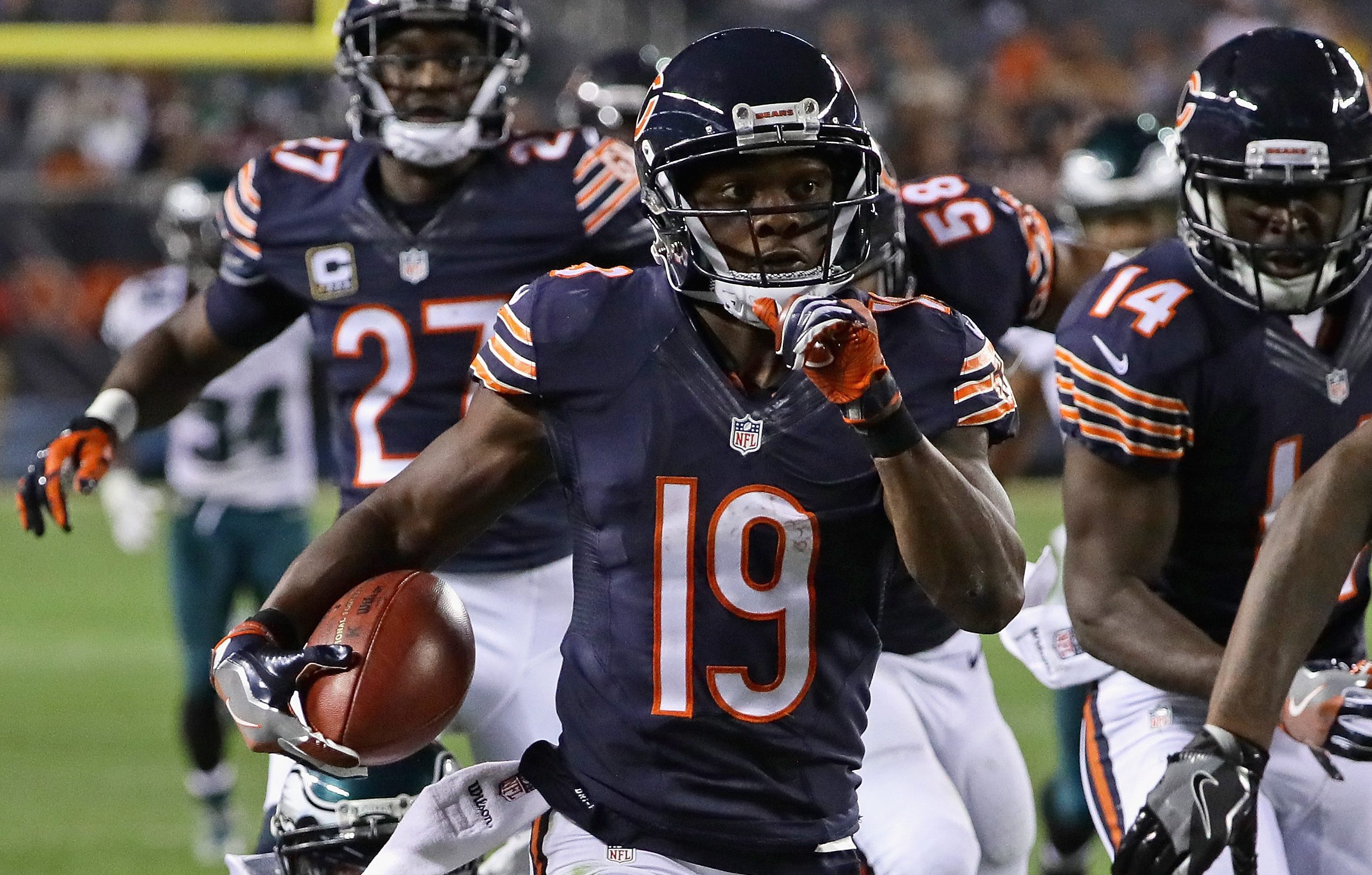 Eddie Royal returns a punt for a touchdown against the Eagles. (Jonathan Daniel/Getty Images)