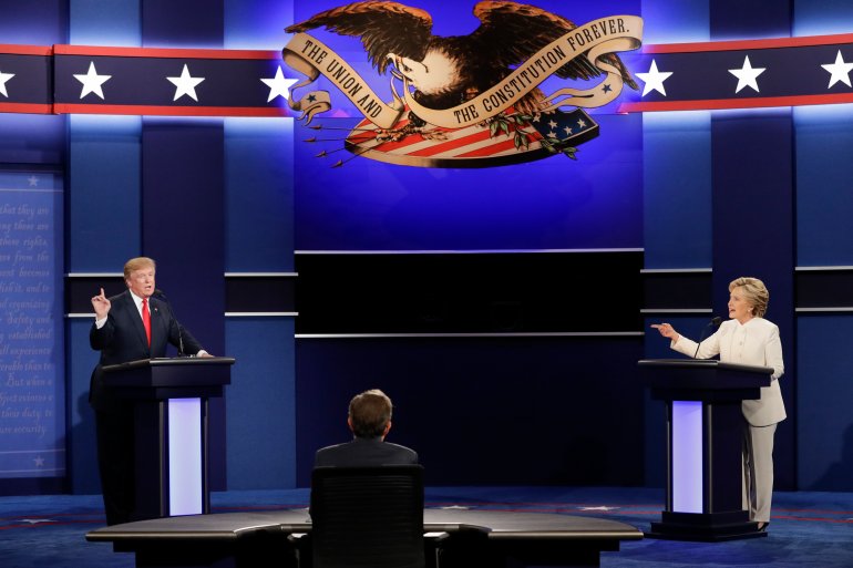 Democratic presidential nominee Hillary Clinton exchanges views Republican presidential nominee Donald Trump during the third presidential debate at UNLV in Las Vegas, Wednesday, Oct. 19, 2016. (AP Photo/John Locher)