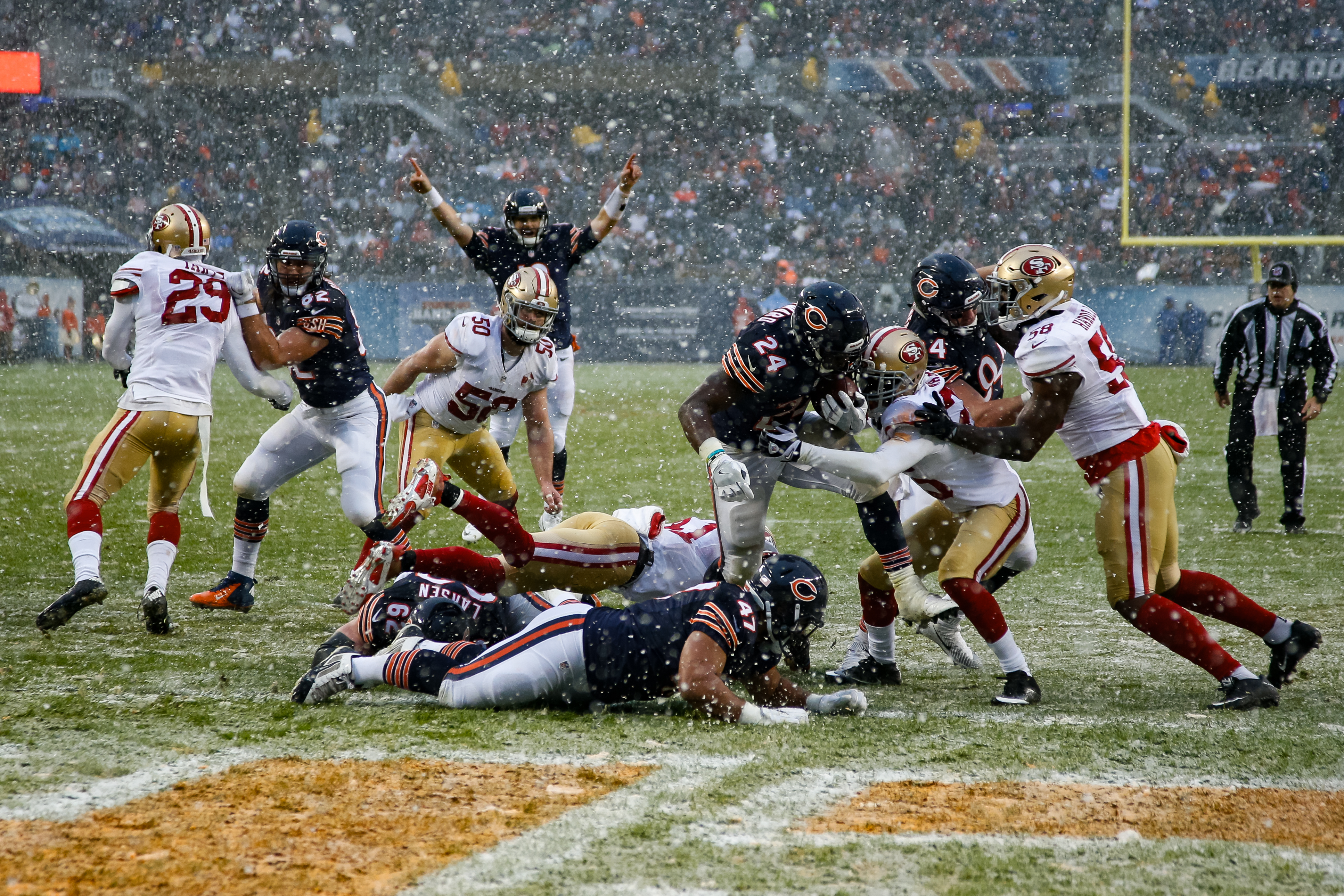Jordan Howard runs for a touchdown while Matt Barkley celebrates in the background. (Photo by Joe Robbins/Getty Images)