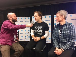 Justin Kaufmann with WE Day Co-Founder Craig Kielburger and Allstate Chairman and CEO Tom Wilson