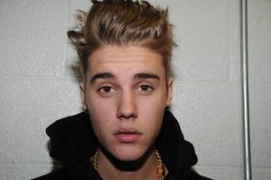 Justin Bieber was under the influence of alcohol, pot and Xanax when police stopped him for drag racing in Miami Beach in January, police documents allege. "Yeah, we were smoking all night at the studio," the singer told a police officer who told him he "reeked of marijuana," according to documents released Thursday. Bieber was "excited," "talkative," "insulting" and "cocky" and "used profanity," according to a intoxication evaluation conducted by police in the Florida city. His speech was mumbled, his pupils dilated, his face flushed and his eyes bloodshot, the assessment said.