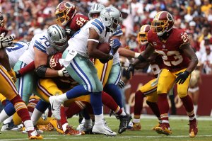 LANDOVER, MD - SEPTEMBER 18: Running back Alfred Morris #46 of the Dallas Cowboys scores a fourth quarter touchdown against free safety DeAngelo Hall #23 of the Washington Redskins at FedExField on September 18, 2016 in Landover, Maryland. (Photo by Patrick Smith/Getty Images)
