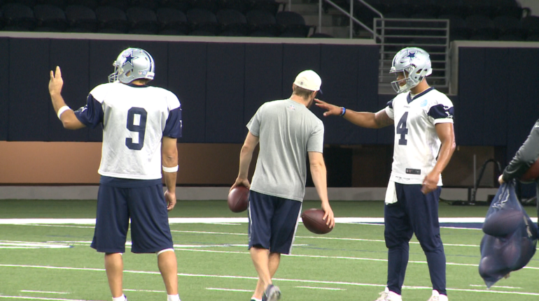 Tony Romo and Dak Prescott take reps at Thursday's practice.