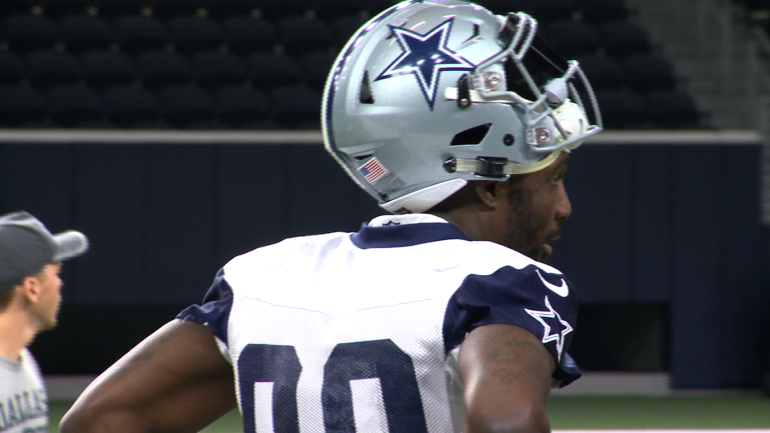 Dez Bryant looks on during the Cowboys practice on Thursday. (Photo By: Tim Roberts)