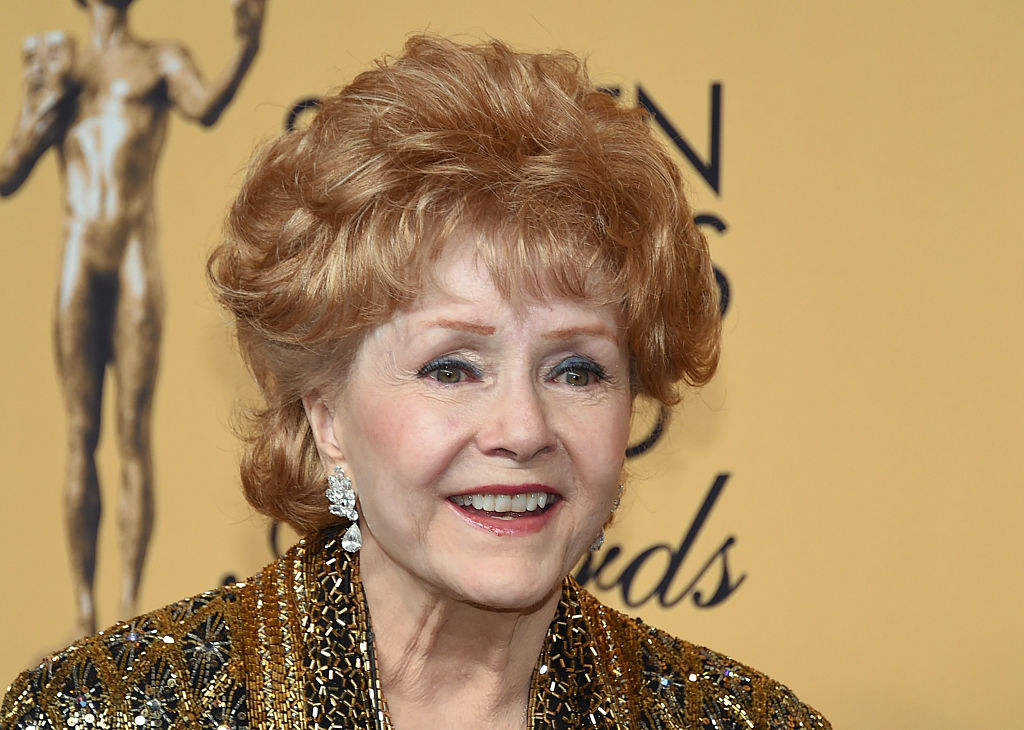 LOS ANGELES, CA - JANUARY 25: Actress Debbie Reynolds, recipient of the Screen Actors Guild Life Achievement Award, poses in the press room during the 21st Annual Screen Actors Guild Awards at The Shrine Auditorium on January 25, 2015 in Los Angeles, California. (Photo by Ethan Miller/Getty Images)