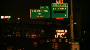 The first part of a Donald Trump related hack on a TxDOT sign in May, 2016.